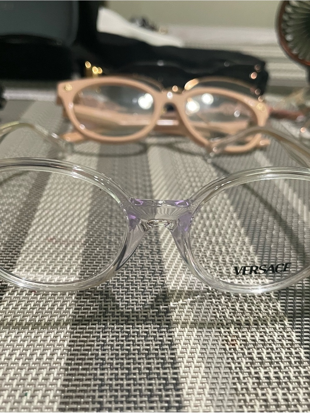 Versace Clear Round Frames with Subtle Lilac Tint